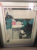 Full framed watercolor painting showing abstract/impressionistic shapes and colors in teal, black, pink, gray, and white with double matting.