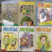 Photo showing front covers of all six books for young readers in the lot.