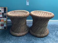 View of both stools side by side showing overall shape and material.