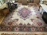 Full view of the antique Miraz area rug showing overall design and condition.