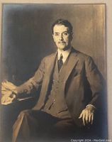 Full view of seated formal male portrait photograph by Ernest Ludwig Ipsen