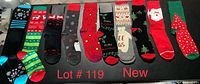 Top view of all 10 pairs of Christmas socks, displaying a variety of holiday designs.
