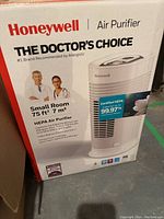 Box of Honeywell air purifier showing the product image, specifications and doctor recommendation for small rooms.