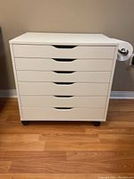 Three-quarter front view of cabinet on wheels