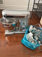 Front and side views showing silver Cuisinart stand mixer with mixing bowl attached and control dial.