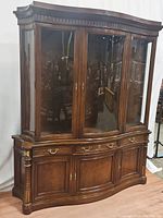 Front view of Karges china hutch showing glass display cabinet on top and wooden buffet with drawers and cabinets below.