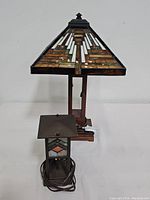Full view of art deco stained glass lamp and vintage office lamp side by side
