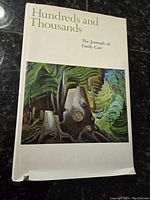 Front cover of 'Hundreds and Thousands: The Journals of Emily Carr' showing the artwork and title.