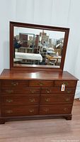 Full view of dresser and mirror, showing overall condition and style