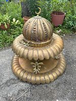 Overall view of three-piece brazier assembled on outdoor ground