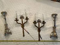 All four items arranged together on a quilted surface with measuring tape for scale.