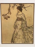 Close view of the print showing woman in gown and branch with fruit