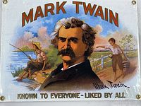 Front view of Mark Twain tribute plaque showing detailed colorful illustration with screw holes and text