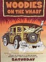 Close-up of the poster artwork showing a cartoon-style wood-bodied car with surfboards and birds, with event title 'Woodies on the Wharf'
