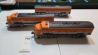 Three Lionel Train Collectors Association F38 Diesel engine units showing full set.