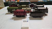 Group shot of all locomotives and cars: #150, #152, #700, #252, Sunoco tanker, livestock car, gondola