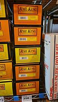 Rail King boxes stacked showing branded packaging from MTH Electric Trains.