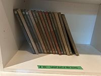 Fifteen volumes of the Great Ages of Man series arranged upright on a shelf, showing the vertical spines with titles and Time Life logo.