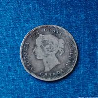 Obverse of 1900 Canadian 5 Cent Queen Victoria silver coin showing Queen Victoria's profile and inscriptions.