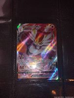 Clear view of Cinderace VMAX holo foil full art Pokemon card showing front design and holographic surface under lighting.