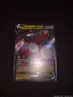 Full view of Regidrago V Full Art Holo Foil Pokémon card showcasing the holographic foil design and artwork.