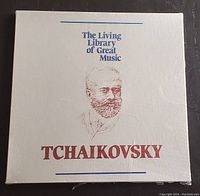 Front image of the album cover showing the title 'The Living Library of Great Music TCHAIKOVSKY' with a sketch of Tchaikovsky's face in brown ink on white background.