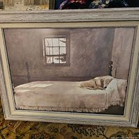 Framed painting of bedroom interior with a dog on bed, titled "Master Bedroom" by Andrew Wyeth.