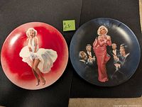 Two Marilyn Monroe collector plates front view showing artwork.