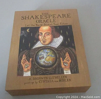 Box of The Shakespeare Oracle tarot deck showing artwork of Shakespeare holding a globe with mystical imagery.