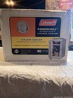 Photo of the front of the original Coleman box showing the Powerchill iceless cooler with 40 quart capacity and dial control.