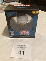 Front view of Marvel Dorbz Howard the Duck vinyl collectible in original box showing figure window and branding.