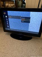 Front view of Samsung TV screen showing picture mode menu options.