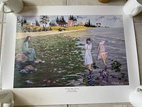 Full view of the 1996 art print depicting women by a shoreline with houses and trees in the background.