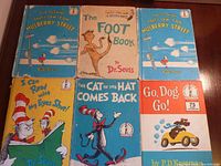 Top-down view of all six Dr. Seuss books showing front covers with colorful illustrations and titles.