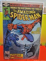 Front cover of The Amazing Spider-Man #200 comic book showing Spider-Man in action swinging on a web fighting Buffalon, dated January 1980, 75 cents price.