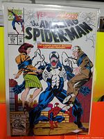 Front cover image of The Amazing Spider-Man #374 comic book showing Venom attacking Richard and Mary Parker.