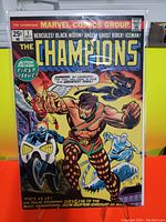Front cover of The Champions comic book issue #1 from October 1975 by Marvel featuring team members Hercules, Black Widow, Angel, Ghost Rider, and Iceman.
