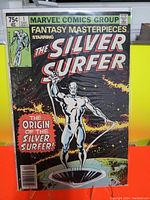 Photo shows cover of December 1979 Marvel Comics Fantasy Masterpieces #1 featuring Silver Surfer with cosmic background and prominent title text.
