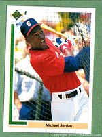 Front of 1991 Upper Deck baseball card showing Michael Jordan in Chicago White Sox batting stance with red jersey and navy cap, holding bat