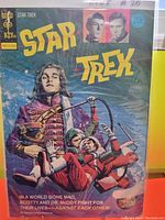 Front cover of Gold Key Star Trek comic #20 from 1973 with full color illustration and price.