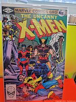 Front cover of The Uncanny X-Men #155 comic book showing the X-Men team with heroic poses in vibrant colors.