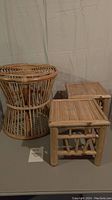 Photo showing one large round rattan stool and two small square bamboo stools/plant stands side by side on a neutral background.