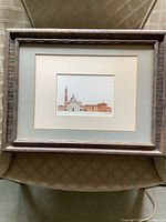 Full framed watercolour painting showing the entire artwork with carved wooden frame and cream mat.