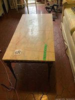 Top view of rectangular marble top coffee table showing surface and overall shape.