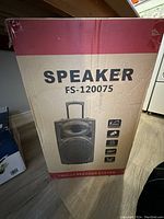 Box of FS-120075 trolley speaker system showing model number and image of the speaker with handle and grille.
