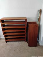 Assembled shelving modules and loose modules with rails