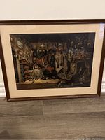 Framed Cornelius Krieghoff print titled 'An Officer’s Trophy Room', showing full artwork and frame.