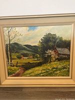 Frontal view of the farm landscape oil painting showing the farm, trees, path, and hills under a cloudy sky, signed lower right.