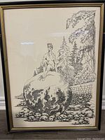 Full view of framed ink drawing showing woman sitting on boulder with surrounding trees and rocks