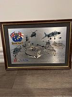Framed metal etching depicting Royal Navy ships, helicopters, and aircraft with British flags and Royal Navy crest.